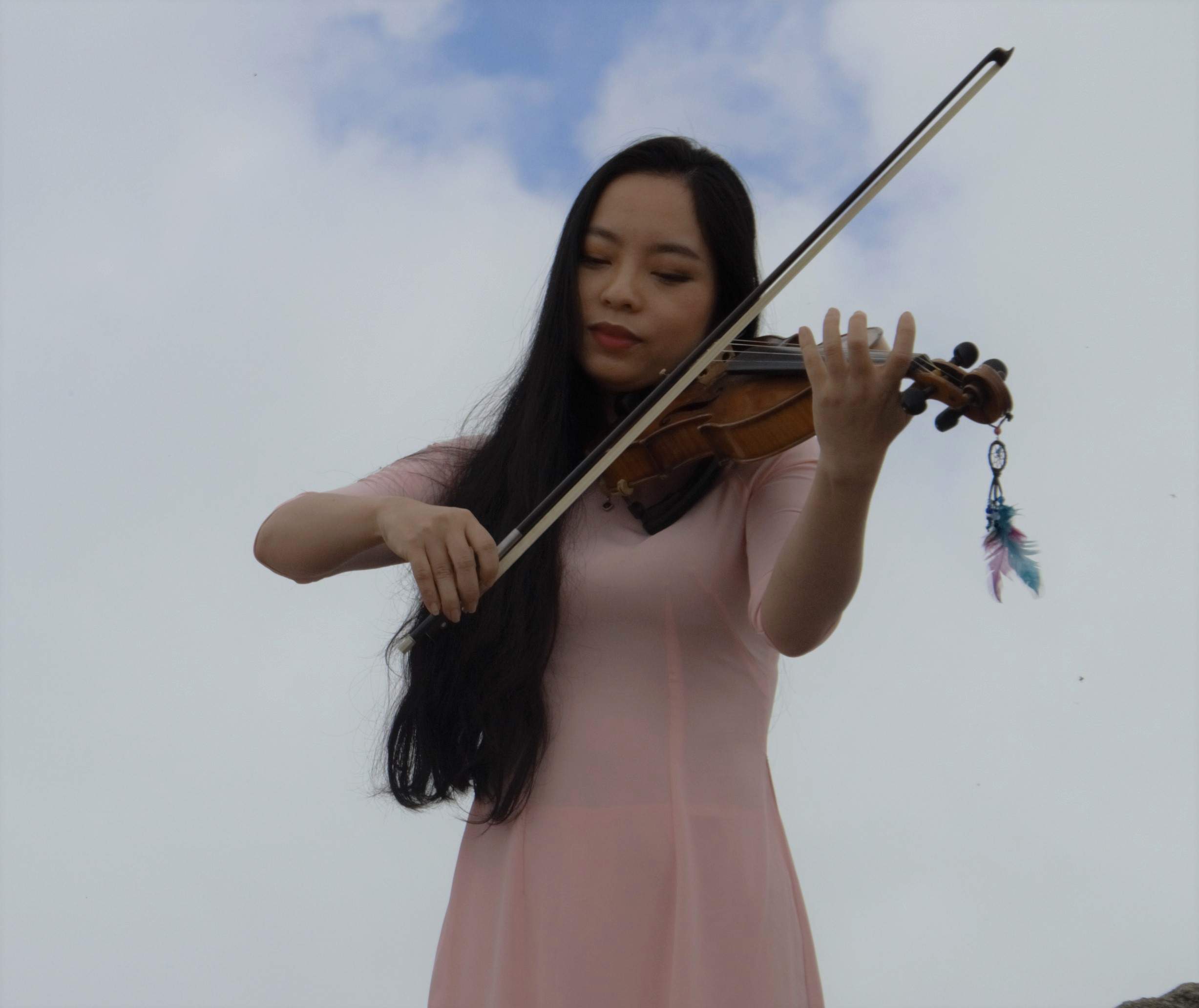 Violinist på Fansipan berjet på 3200m höjd i norra Vietnam nära gränsen till Kina Kamera Nikon D3200