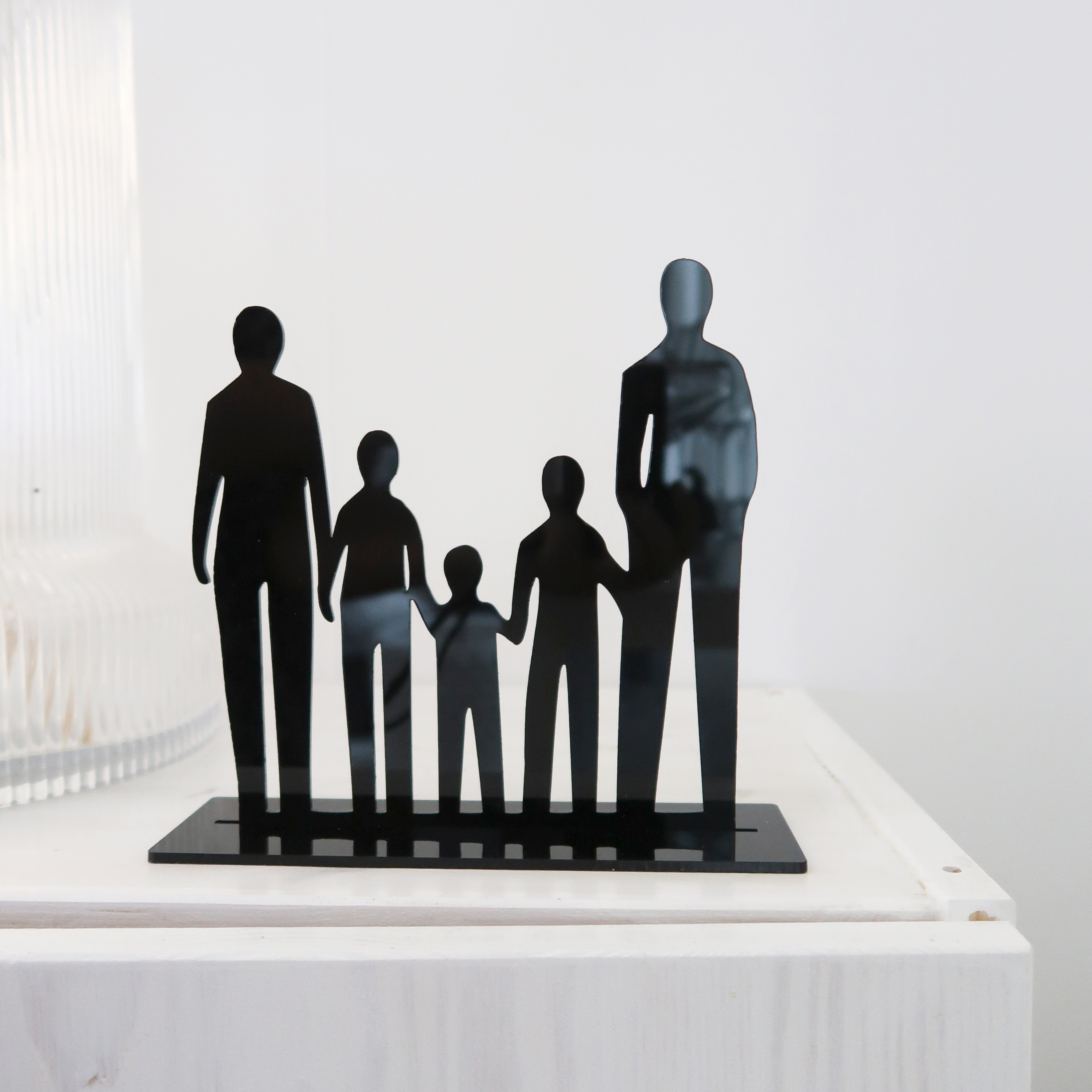 Siluett - Familj med fem familjemedlemmar